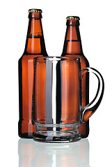 Image showing Glass mug and two bottles of beer, isolated