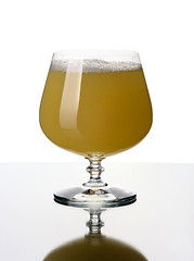 Image showing Glass goblet with a juice, isolated.