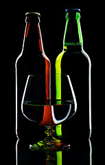 Image showing Bottles of beer, isolated on a black background