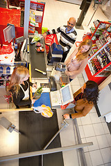 Image showing Shop assistant with customer