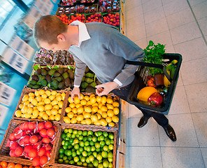 Image showing Male in Supermarket Buying Fruit