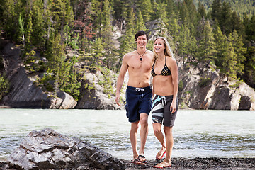 Image showing Young couple enjoying by the lake