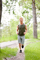 Image showing Young man jogging