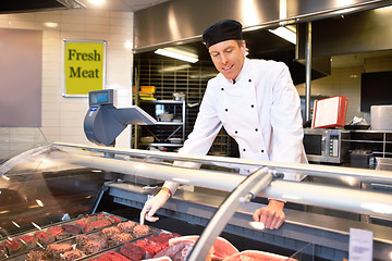 Image showing Fresh Meat Counter with Butcher