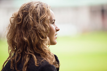 Image showing Contemplative young woman looking away