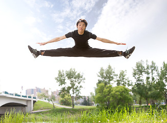 Image showing Man jumping in the air