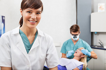 Image showing Assistant with dentistry work in the background