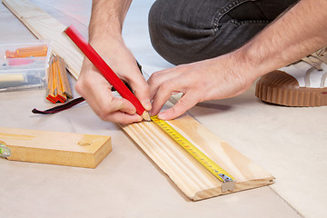 Image showing Cropped hand of a carpenter