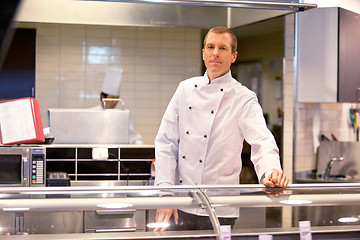 Image showing Butcher in Grocery Store