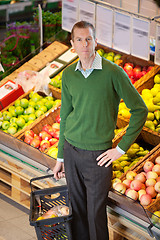 Image showing Portrait of serious man in shopping centre