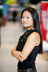 Image showing Asian Woman Standing in Supermarket