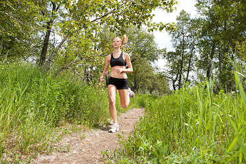 Image showing woman jogging in a park