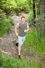 Image showing Handsome man jogging
