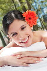 Image showing Girl with flower in her hair