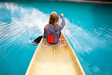Image showing Woman rowing boat