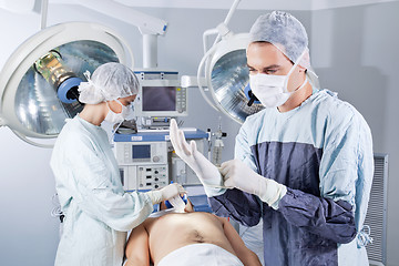 Image showing Doctor preparing for surgery