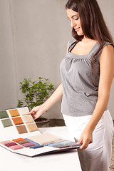 Image showing Interior Designer with Carpet Swatch