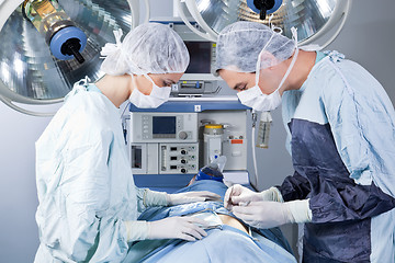 Image showing Medical professionals performing an operation