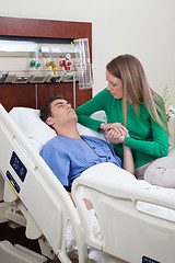 Image showing Man on a hospital bed