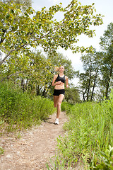 Image showing Beautiful woman jogging