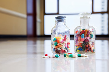 Image showing Medical capsules and tablets in a bottle