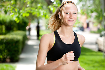 Image showing Beautiful woman jogging