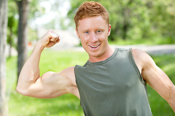 Image showing Athletic man showing muscles