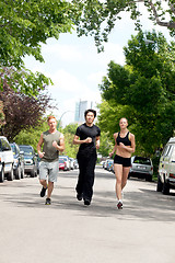 Image showing People running on the street