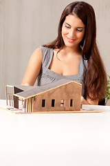 Image showing Female Architect with House Model