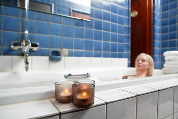 Image showing Beautiful young woman relaxing in bathtub