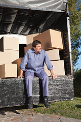 Image showing Thoughtful man sitting in the truck