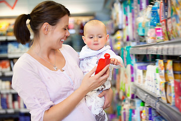 Image showing Mother Shopping with Baby in Supermarket