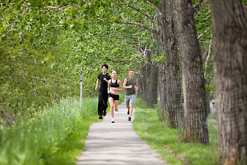 Image showing Friends jogging