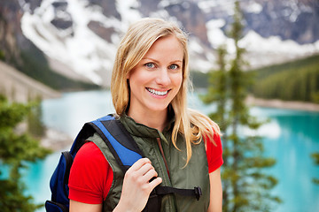 Image showing Beautiful female hiker smiling