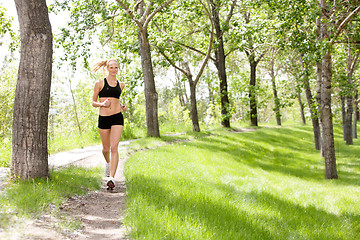 Image showing Portrait of woman jogging