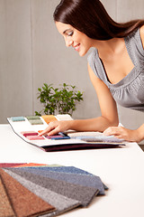 Image showing Designer with Carpet Samples