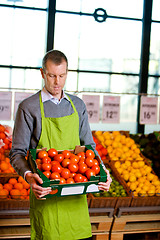 Image showing Grocer with Tomatoes