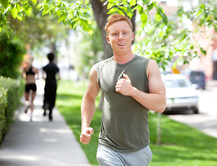 Image showing People running on walkway