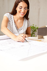 Image showing Female Architect with Blueprints