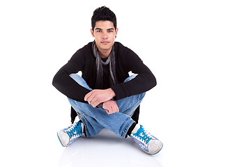 Image showing Handsome Young Man Sitting on the Floor