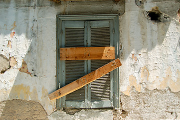 Image showing boarded up window