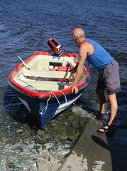 Image showing Man with boat