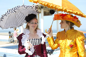 Image showing Ladies with umbrellas