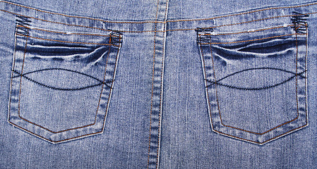 Image showing Blue jeans fabric with pockets 