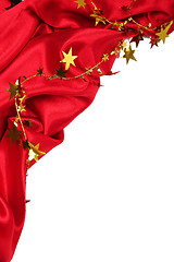 Image showing Smooth Red Silk with golden stars as holiday background 