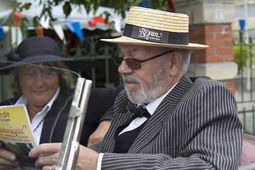 Image showing Driver with a straw hat.