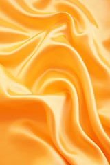 Image showing Smooth elegant golden silk as background 