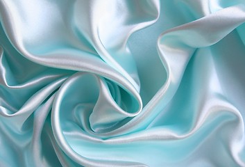 Image showing Smooth elegant blue silk as background 