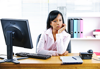 Image showing Angry businesswoman at desk