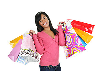 Image showing Happy young black woman with shopping bags